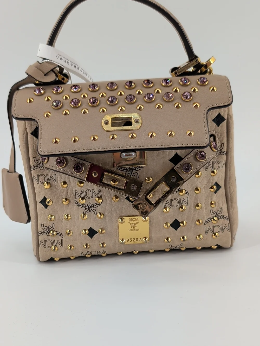MCM Beige Visetos Top Handle Bag with Gold Hardware and Pink Crystal Studs